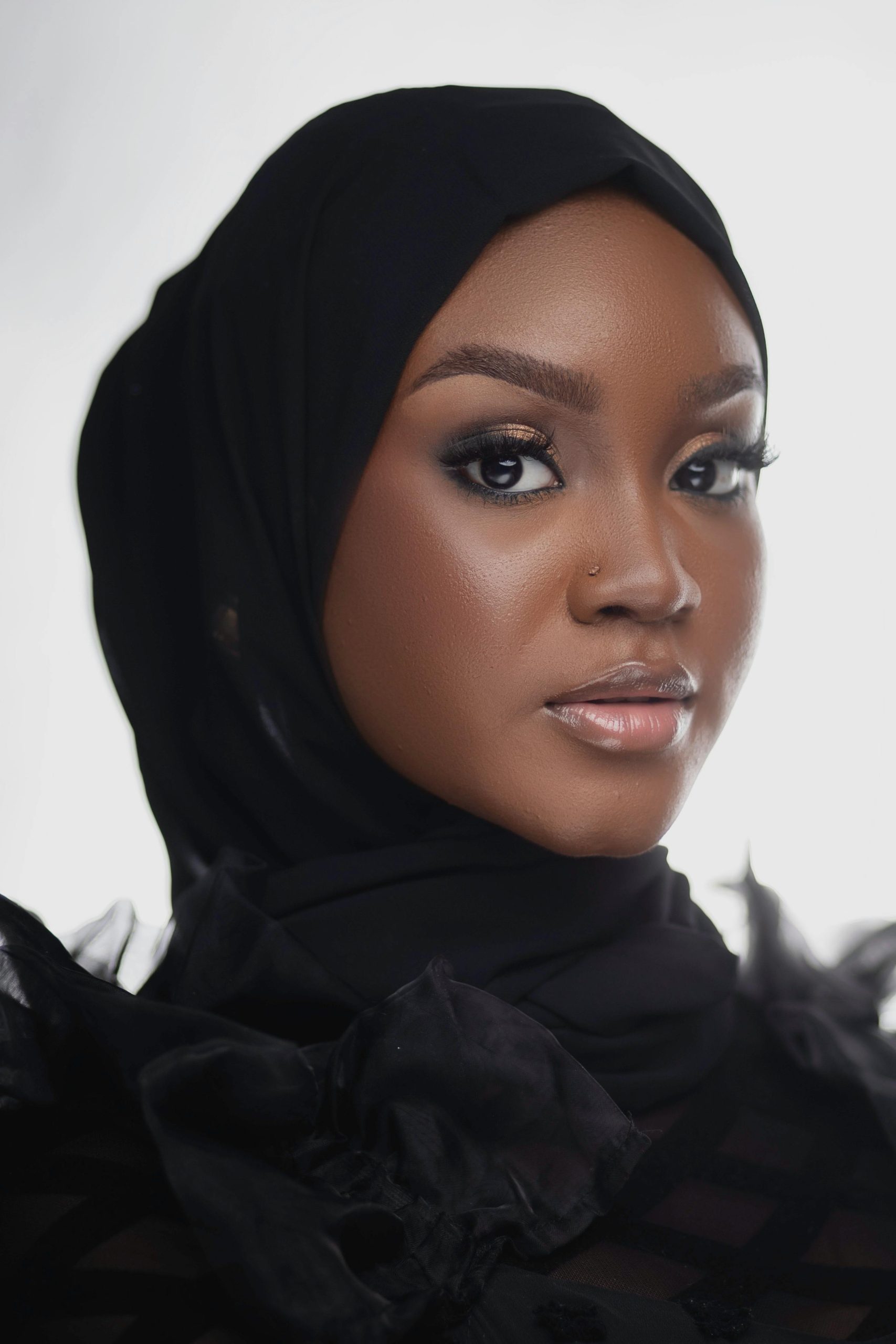 Stunning portrait of a fashionable woman wearing a hijab, capturing grace and beauty.